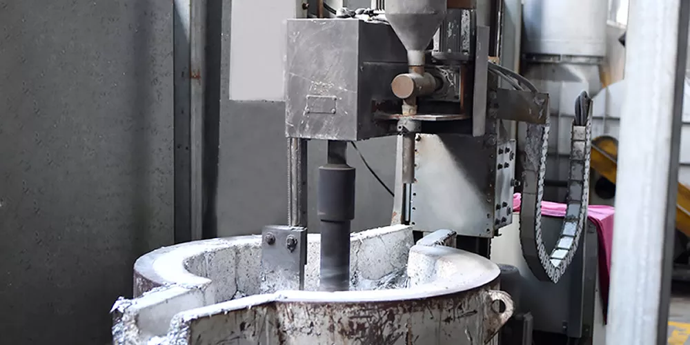 The molten metal is injected into the mold under high pressure