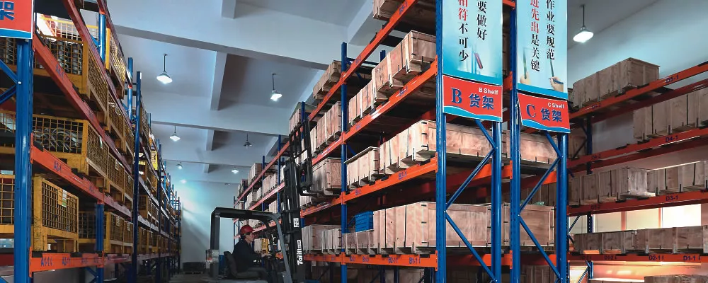 SAIVS warehouse workers organize devices on shelves
